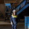 A Stena Aluminium employee walking through the production environment