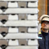 A Stena Aluminium employee inspecting the material